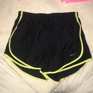 black and yellow nike shorts